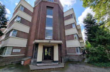 The first of two main entrance doors to the Mansfield Court apartments in Nottingham
