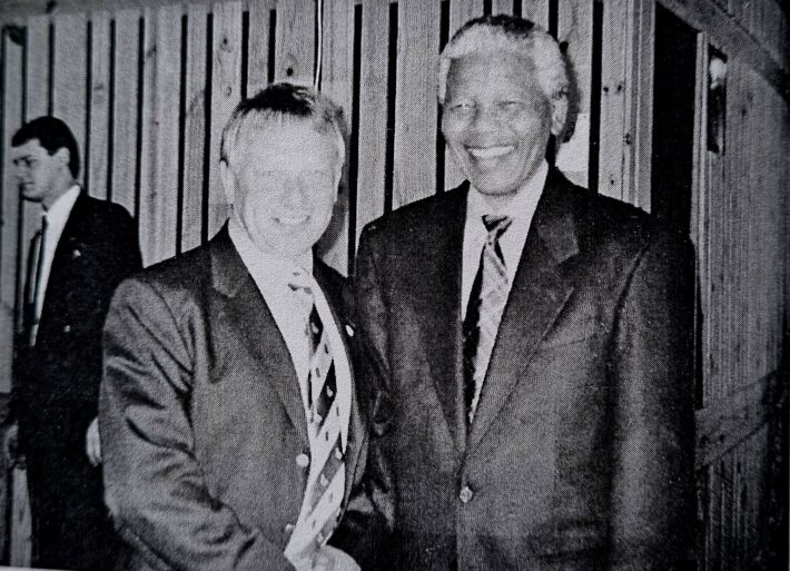 John Elliott meeting Nelson Mandela in 1993, two years before the Rugby World Cup in South Africa.